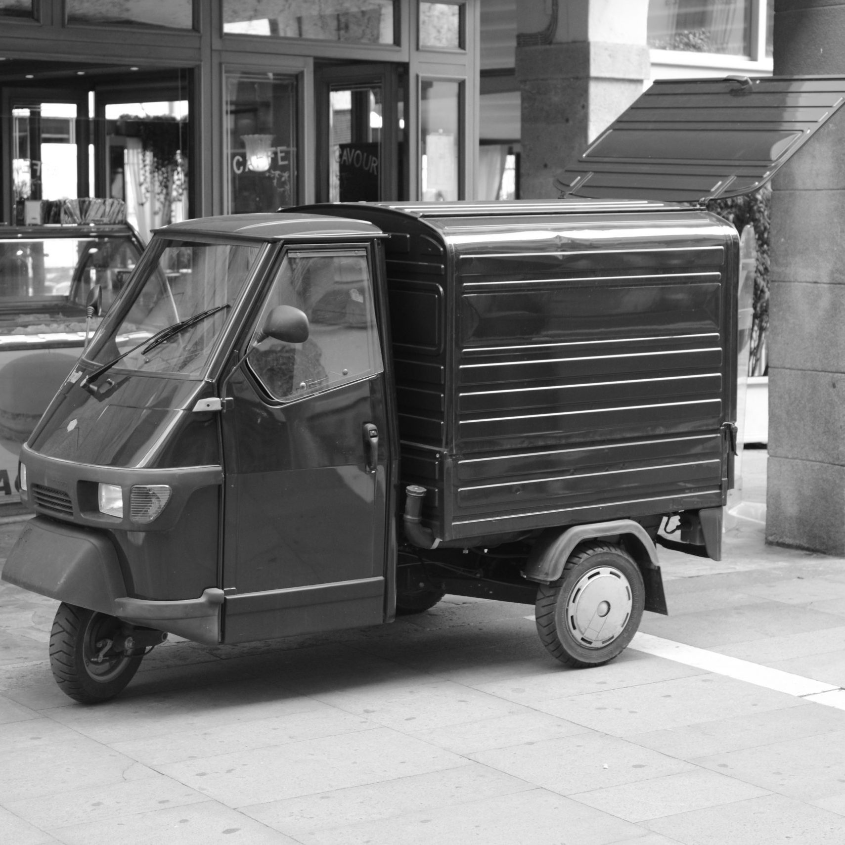 PADUA, ITALY - JUNE 18, 2015: Piaggio Ape a three-wheeled light commercial vehicle based on a vespa scooter produced since 1948 by Italian company Piaggio